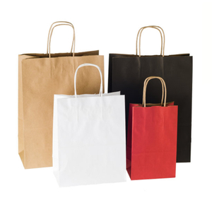 Sacs en papier blanc avec poignées en vrac